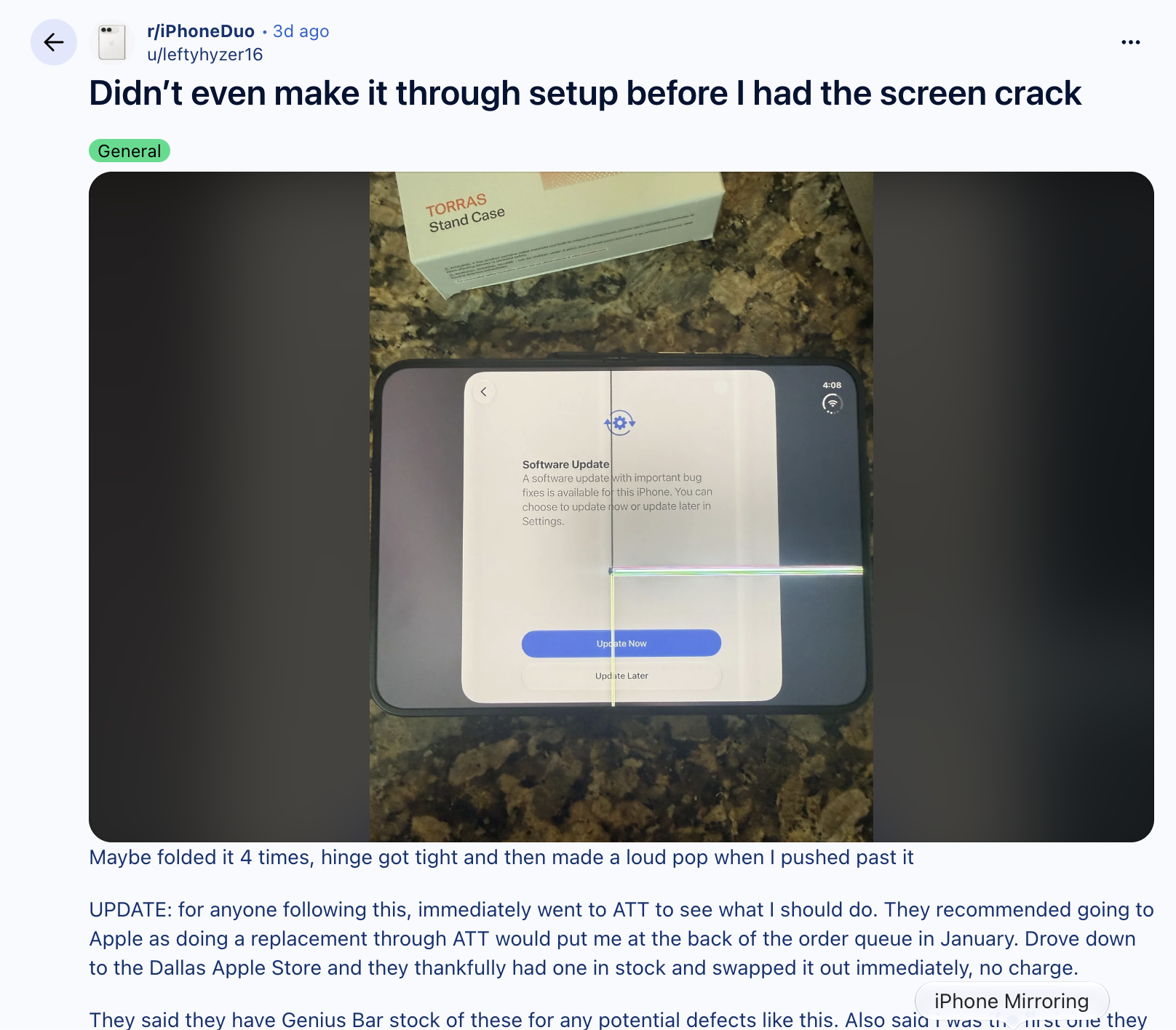 Screenshot of a Reddit post titled "Didn't even make it through setup before I had the screen crack", showing an iPhone Duo unfolded on a granite counter with a vertical line and a horizontal multicoloured line across the inner screen on the setup page.